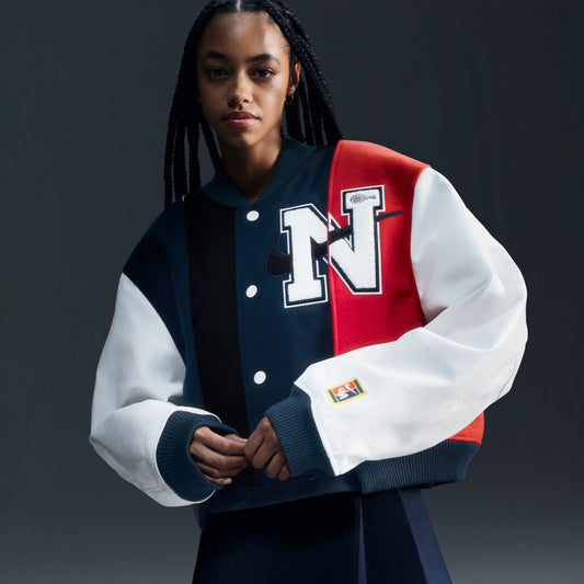 NIKE WOMEN BY YOON OS VARSITY JACKET - BLACK/ARMORY NAVY/PHANTOM/WHITE